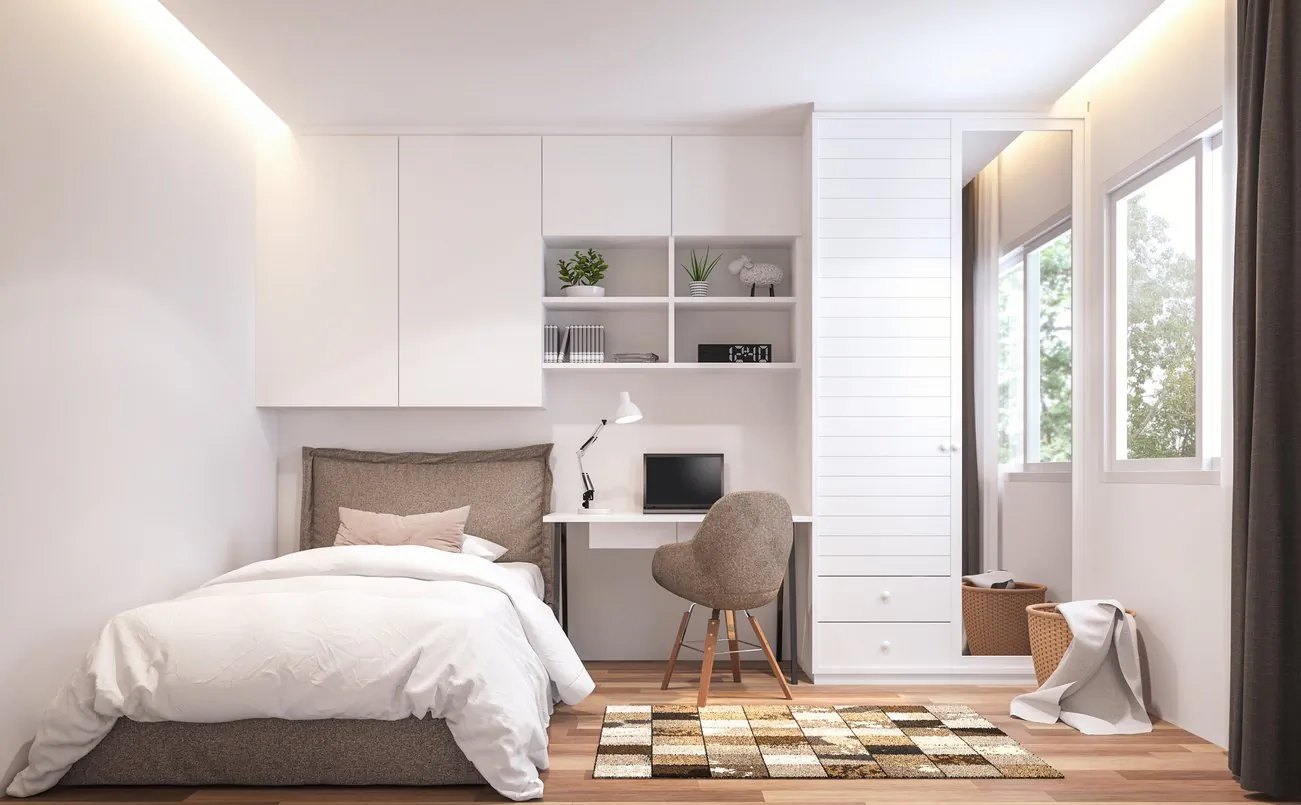 A top-down view of a small bedroom layout featuring a corner bed and wall shelves.